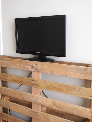 Finally, our pallet TV stand. Tim secured it to the wall using 